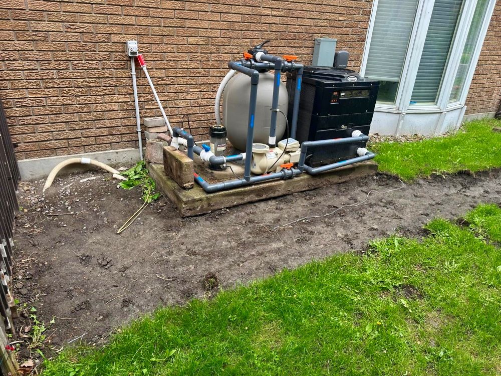 Existing grass area before interlock walkway installation.
